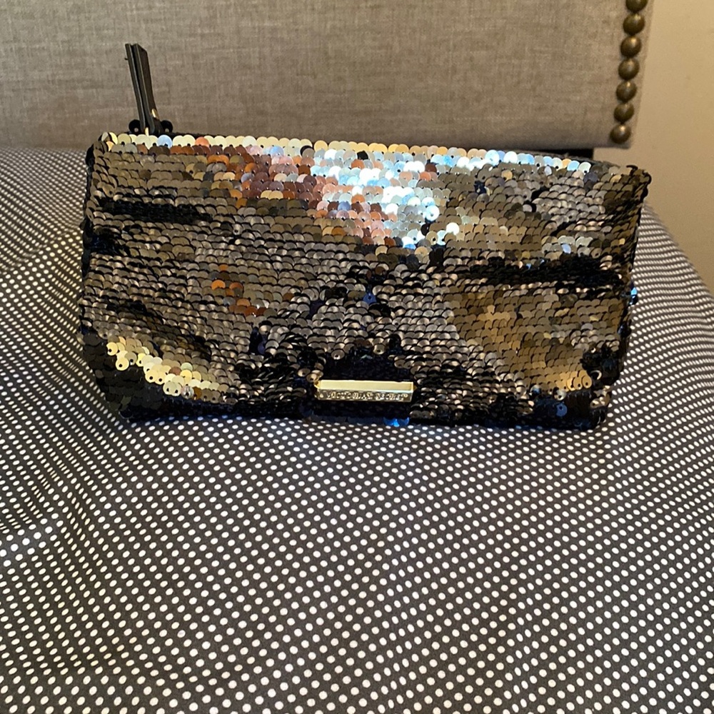 Never used Victoria secret unique gold or silver sequins evening bag .